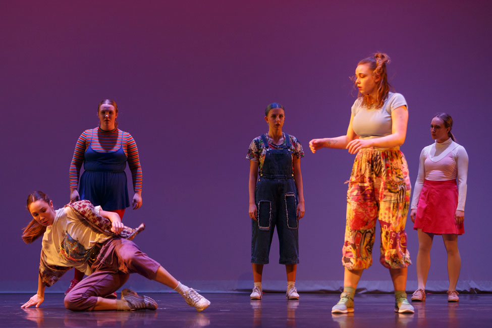 Five dancers appear on stage in Pina Pt. 2