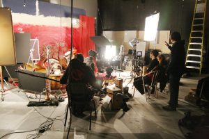 AMPD students shooting large-scale scenes in a soundproof studio
